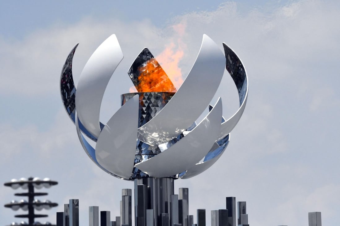The Tokyo Olympic and Paralympic cauldron burns. The Paralympics might go ahead with no spectators present, at the Olympics mostly did. Photo: Kyodo