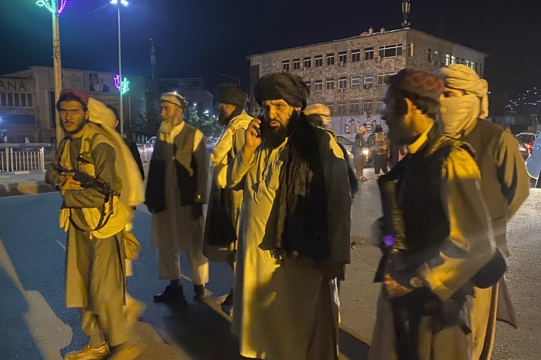 Taliban fighters take control of Afghanistan’s presidential palace in Kabul. Photo: AP