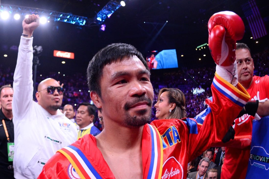 Manny Pacquiao enters the ring to face Keith Thurman for the WBA super welterweight title at MGM Grand Garden Arena. Photo: USA Today