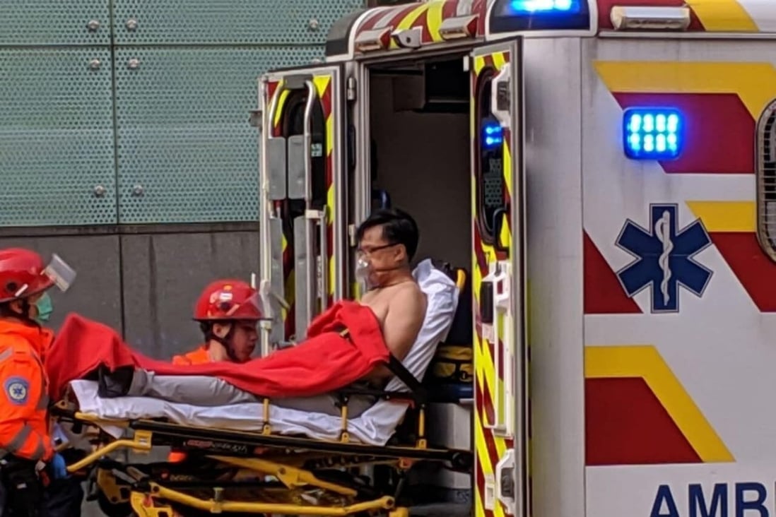 Lawmaker Junius Ho is put into an ambulance after being stabbed during an attack on November 6, 2019. Photo: Handout