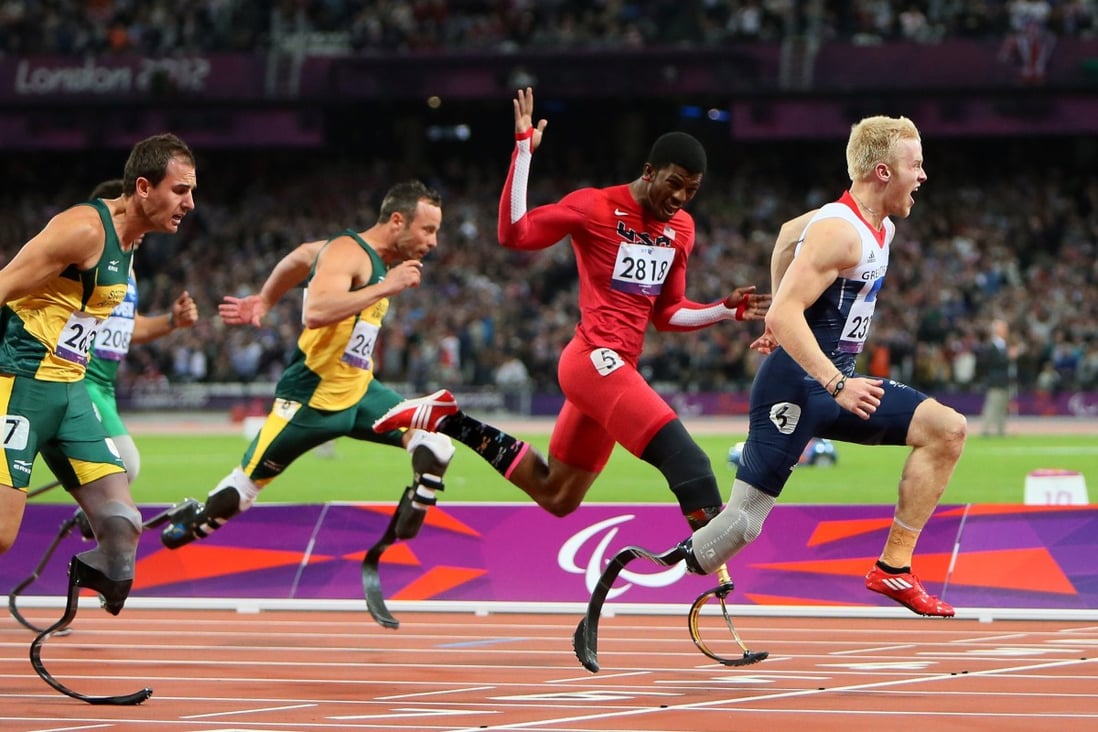Gold medallist Jonnie Peacock of Britain leads the way during the men's 100m T44 final at the London 2012 Paralympic Games. Photo: Xinhua