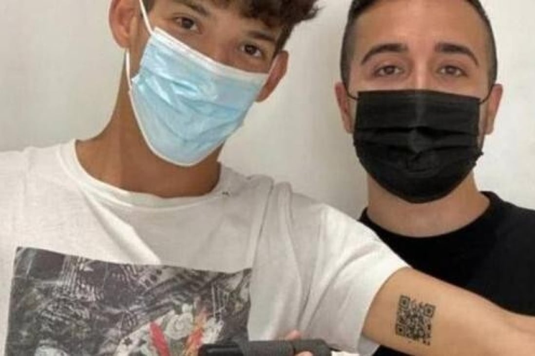Italian student Andrea Colonnetta discussed his latest inking with tattoo artist Gabriele Pellerone before deciding on something practical and topical. Photo: Twitter