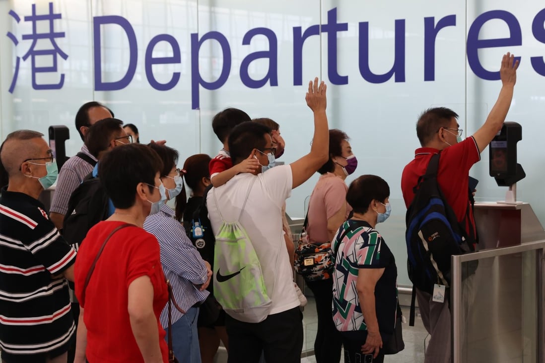 Family and friends wave goodbye to loved ones leaving the city at Hong Kong International Airport. Photo: Nora Tam