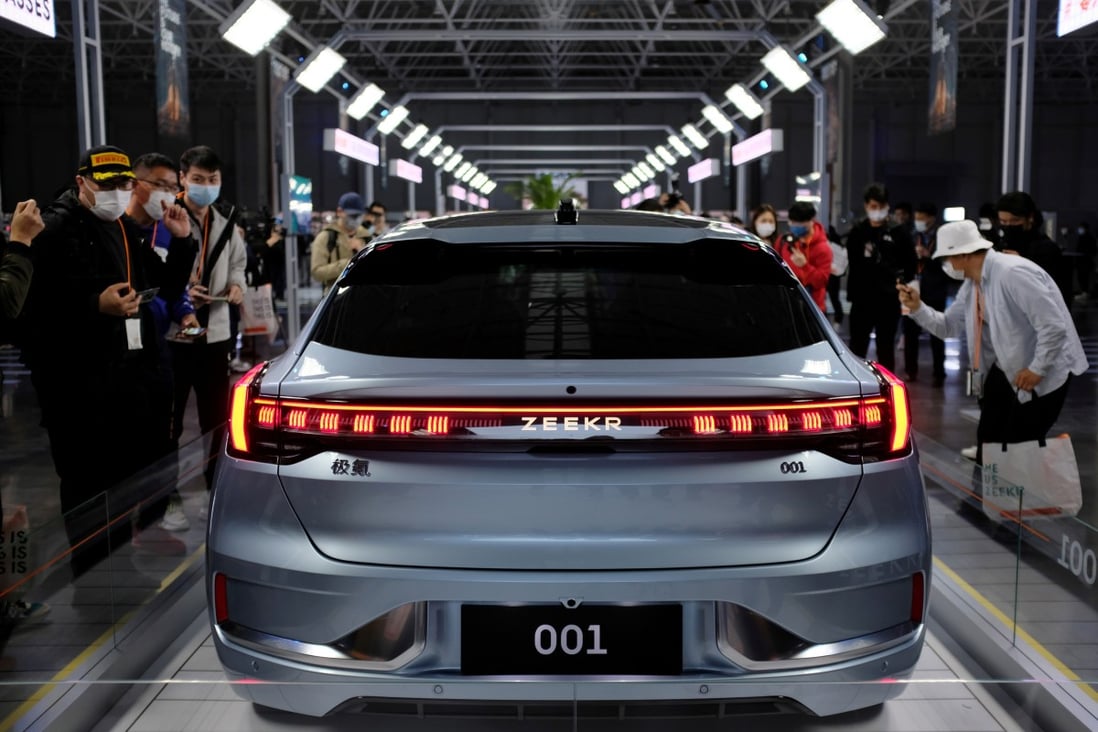 Visitors check a Zeekr 001, a model from Geely's new premium electric vehicle (EV) brand Zeekr, at its factory in Ningbo, Zhejiang province, China April 15, 2021. Photo: Reuters