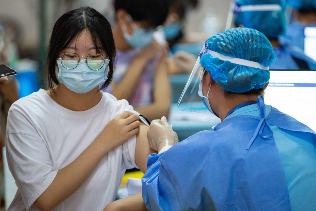 Chinese health officials late last month recommended booster shots for high-risk and vulnerable groups, but said further study was needed before extra jabs were considered for the general public. Photo: STR/AFP