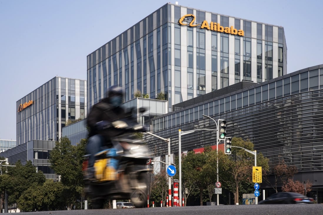 A motorist travels past an Alibaba office building in Shanghai, China, on December 24, 2020. Photo: Bloomberg
