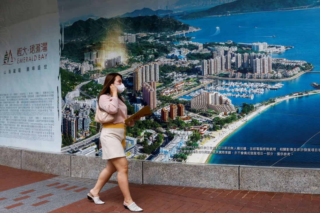 An advertisement for a China Evergrande development in Hong Kong. The company’s half-year profit dropped 29 per cent compared with a year earlier. Photo: Reuters