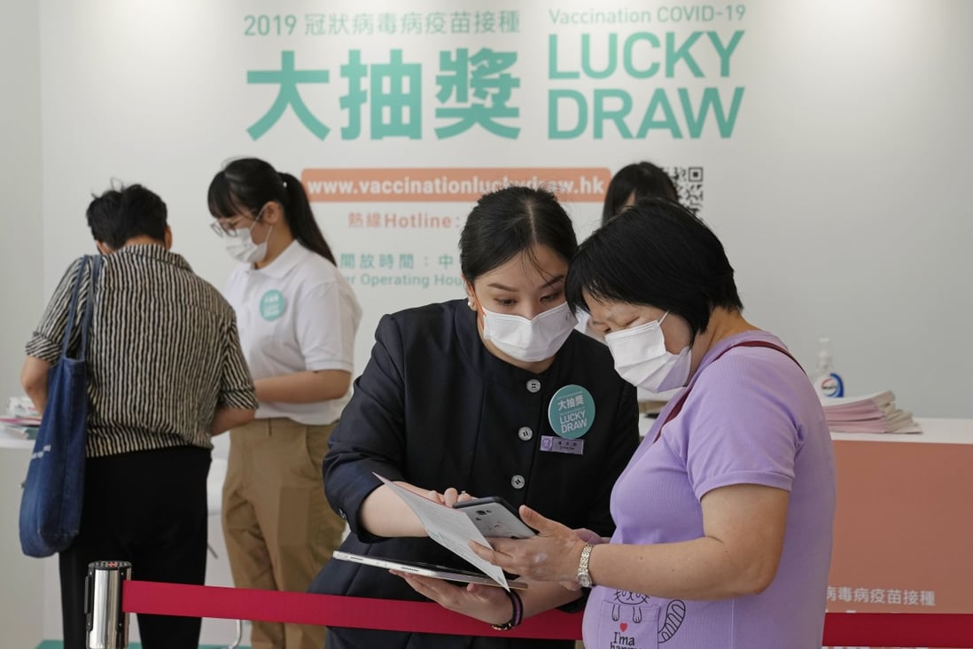 People register for a lottery in a Grand Central residential building complex in Hong Kong. Photo: AP