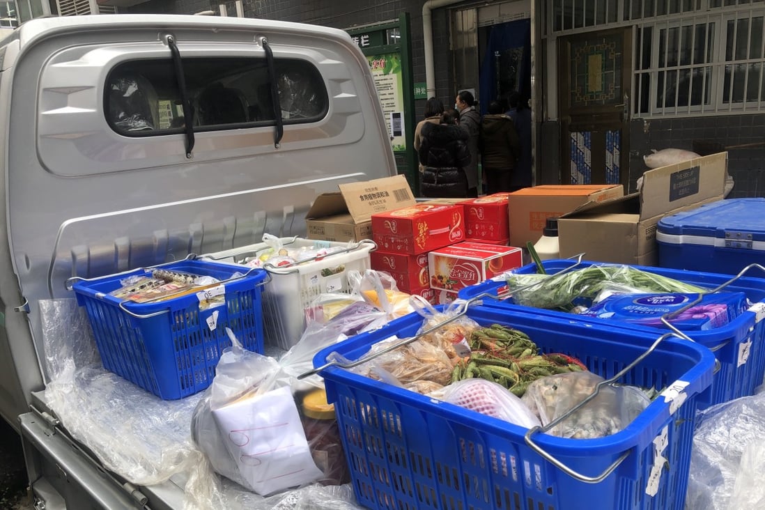 A delivery truck carries groceries and other products purchased by residents at a community in Lichuan county, Hubei province, China. Photo: Jane Zhang