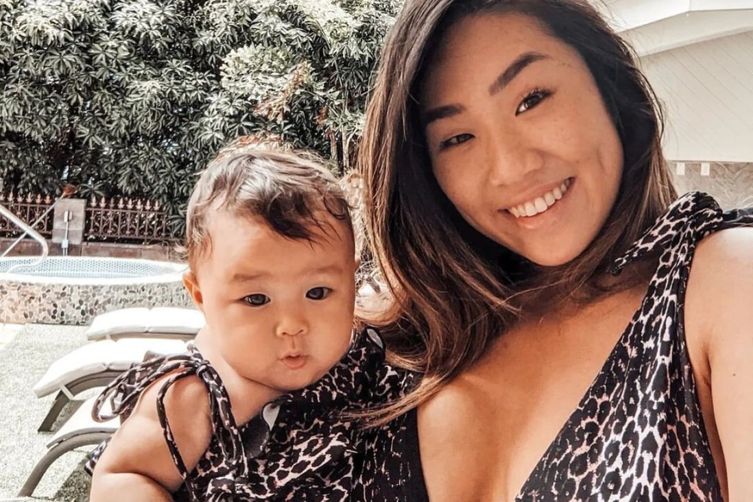 Angela Lee poses with her baby daughter. Photo: Instagram/@angelaleemma