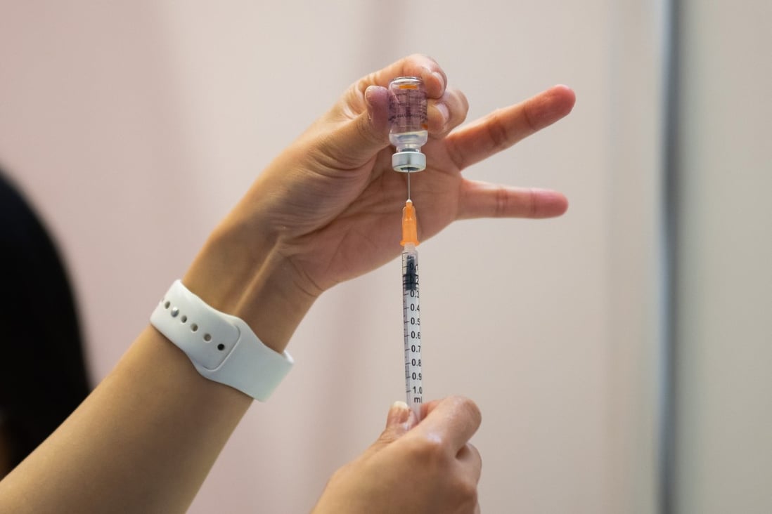 A nurse filling a syringe with a dose of a coronavirus vaccine at a community vaccination center in Hong Kong. Photo: TNS