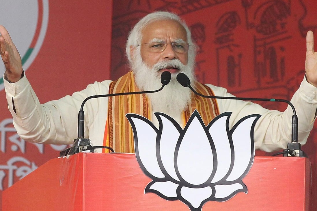Modi speaks to supporters during a campaign rally in April. Photo: TNS