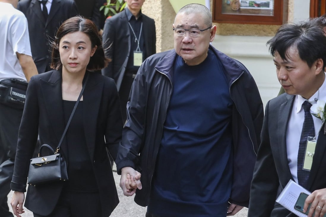 Joseph Lau Luen-hung (right) and his wife Chan Hoi-wan (left) during the funeral service of the real estate tycoon Walter Kwok Ping-sheung held at St. John’s Cathedral in Hong Kong on 1 November 2018. Photo: Felix Wong.