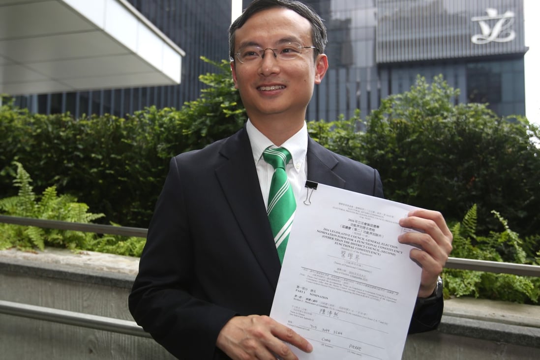 Dr Pierre Chan submits his application to run in the Legislative Council elections in 2016. Photo: Edward Wong