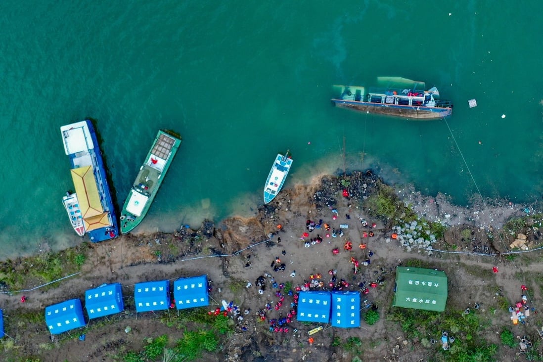 Rescuers work at the site where a passenger ferry overturned in Zangke town in Liuzhi district, in south China’s Guizhou province. Photo: Xinhua