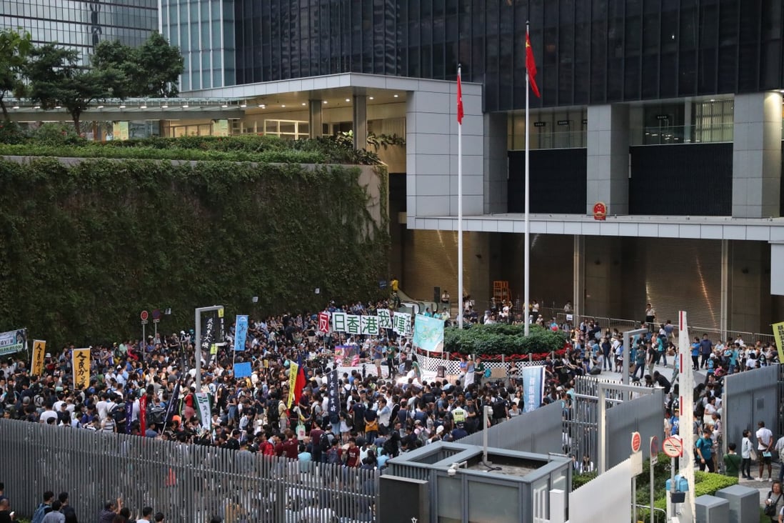 Protesters gather for a forum decrying Hong Kong’s Lantau Tomorrow Vision development plan outside government offices in 2018. Photo: Edward Wong