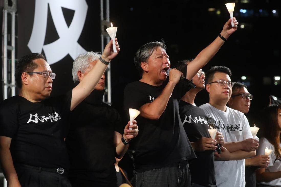 Albert Ho (left) and Lee Cheuk-yan (with microphone) attend the annual Tiananmen Square vigil at Victoria Park in 2019. Photo: Edmond So