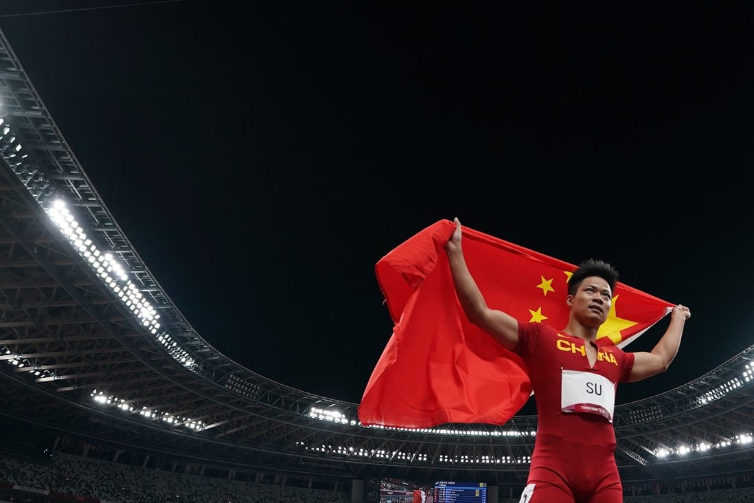 Su Bingtian of China reacts after the men's 100m final at the Tokyo 2020 Olympic Games. Photo: Xinhua
