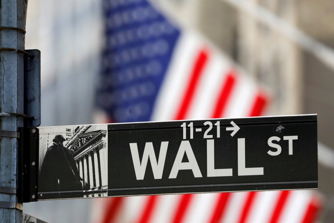 A street sign for Wall Street is seen outside the New York Stock Exchange in New York City on July 19, 2021. Photo: Reuters