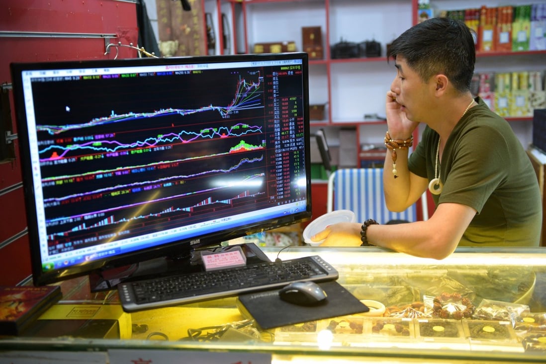 China stocks retreat as Evergrande delays debt repayment while PBOC