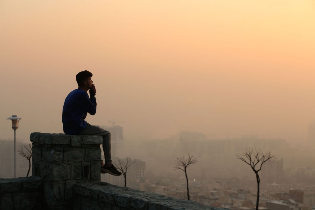 Smog obscures the view of Tehran from the Saad Abad mountain north of the Iranian capital in January. Photo: AFP