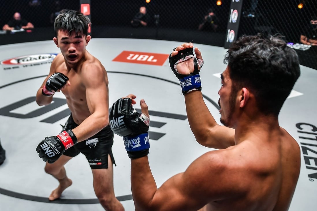 Christian Lee pressures Ok Rae-yoon against the cage. Photo: ONE Championship
