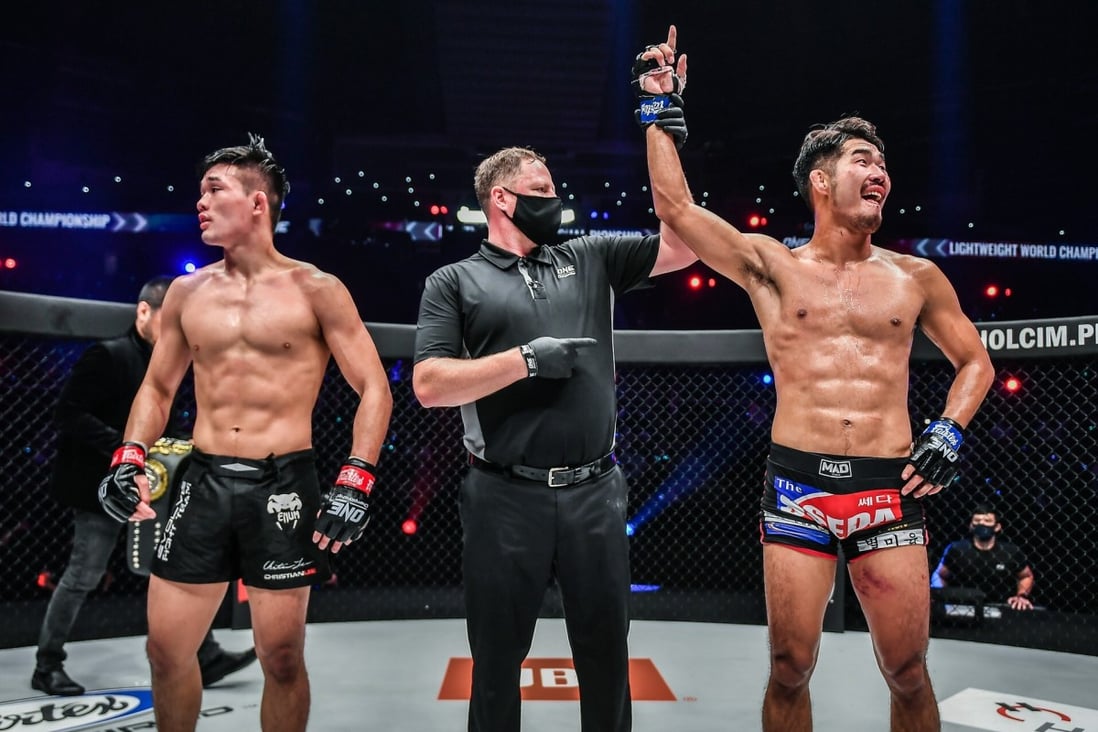 Ok Rae-yoon's arm is raised after his unanimous decision win against Christian Lee. Photos: ONE Championship