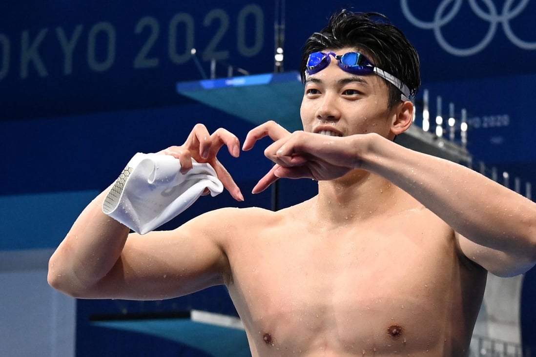 China's Wang Shun celebrates after winning the final of the men's 200m individual medley at the Tokyo 2020 Olympic Games. Photo: AFP