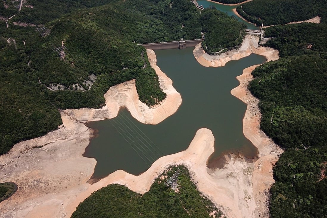 Low water level at Hong Kong’s Tai Tam Upper Reservoir amid an unprecedented heat wave on 29 May 2018, exposing the yellow earth of the reservoir bed. Photo: Winson Wong.