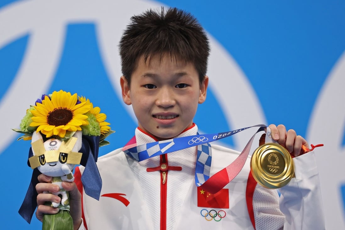 Gold medallist Quan Hongchan of China after winning the 10m platform at the Tokyo 2020 Olympic Games. Photo: Reuters
