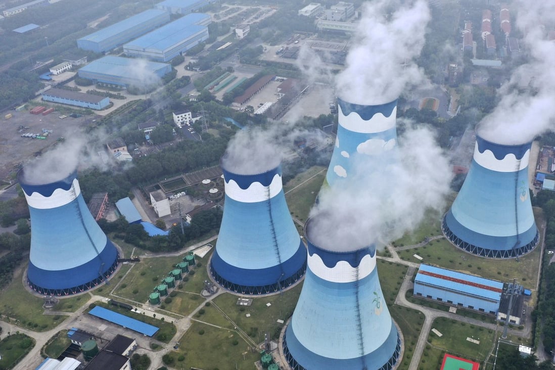 Steam billows out of the cooling towers at a coal-fired power station in Nanjing in east China's Jiangsu province on Monday, Sept. 27, 2021. Photo: AP