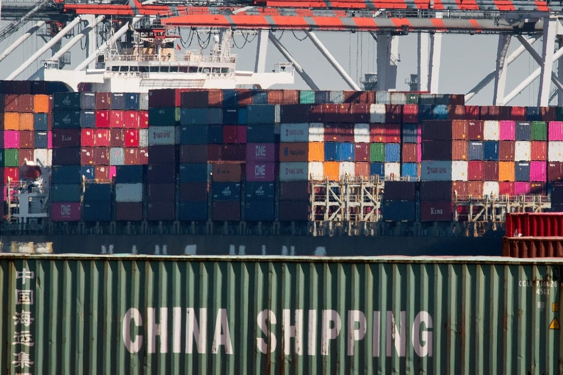 Shipping containers from China are unloaded at the Port of Los Angeles in California. A new report concludes that the country is not on a track to becoming a market economy. Photo: AFP