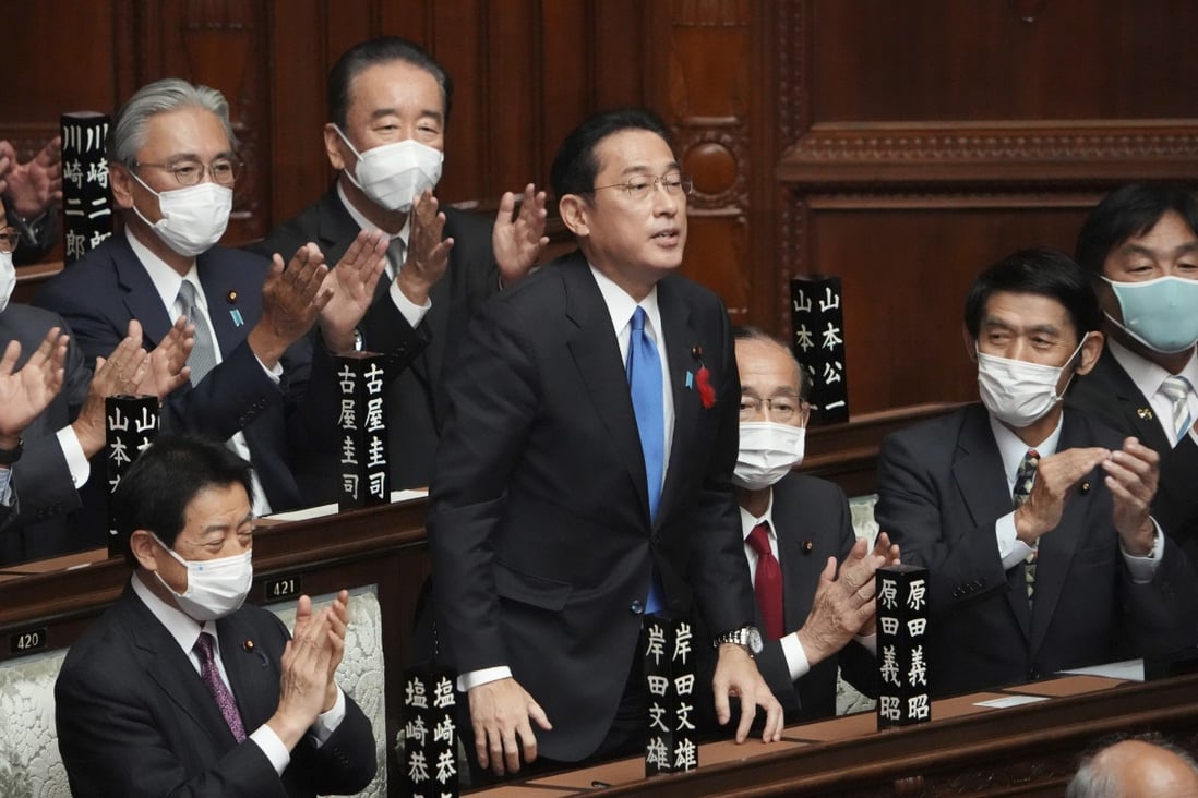 Fumio Kishida is applauded after being elected as Japan’s new prime minister at the parliament's lower house in Tokyo. Photo: AP