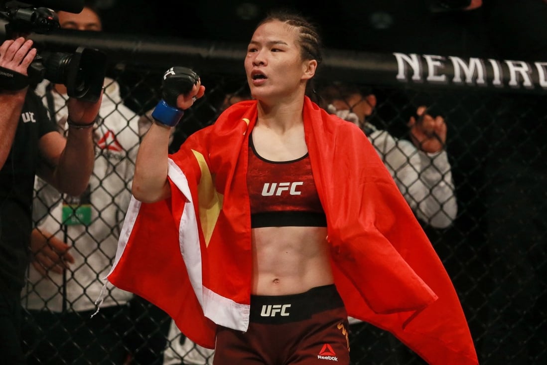 Zhang Weili of China celebrates after defeating Jessica Andrade in Shenzhen to become UFC strawweight champion in August 2019. Photo: AFP