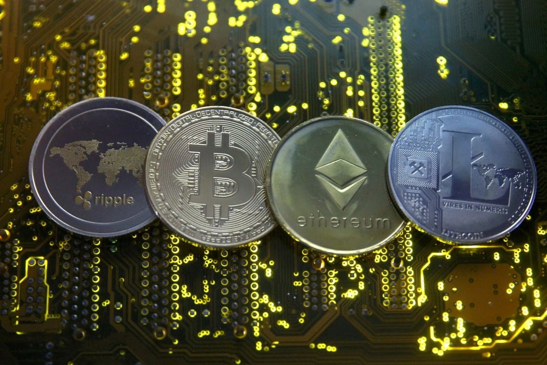 Representations of the Ripple, bitcoin, ether and Litecoin virtual currencies seen on a PC motherboard on February 14, 2018. China’s crackdown on cryptocurrency mining has effectively pushed out nearly all related operations, sending its portion of the bitcoin hash rate to zero as the US becomes the top market at 35 per cent. Photo: Reuters