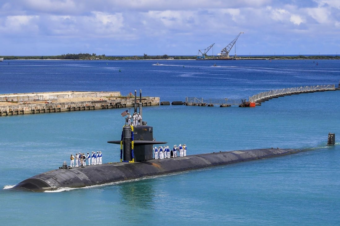 The Los Angeles-class fast attack submarine USS Oklahoma City returns to the US Naval Base in Guam. Photo: AP