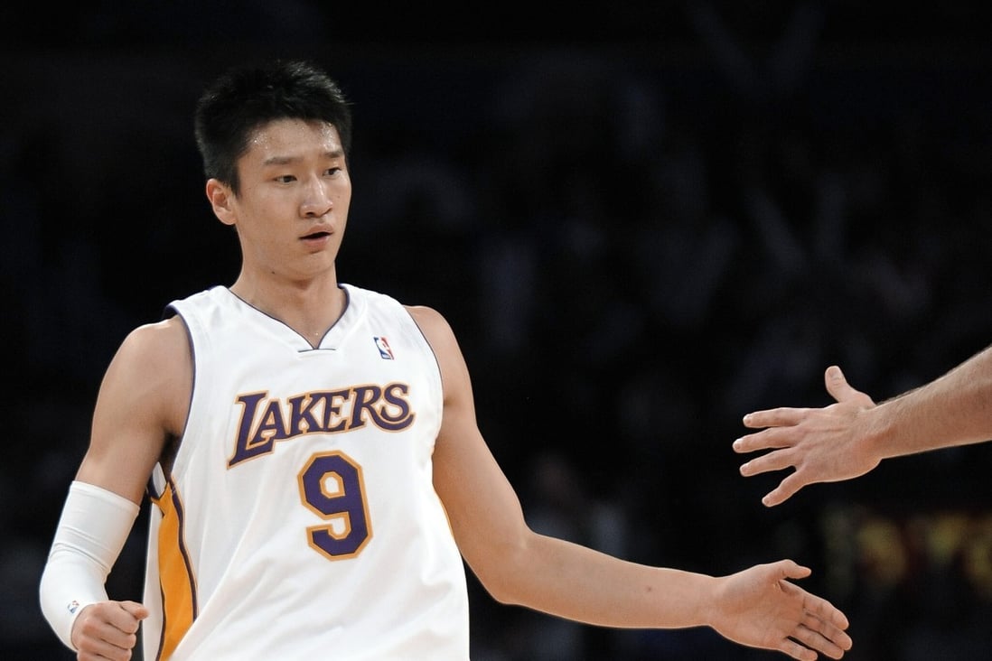 Los Angeles Lakers guard Sun Yue of China, celebrates after scoring his first NBA points against the Milwaukee Bucks at the Staples Center in Los Angeles in 2008. Photo: AP