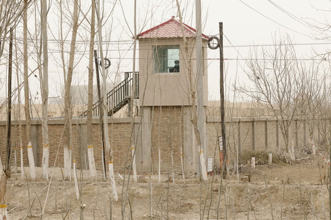 A security person watches from a guard tower around a detention facility in Yarkent county in northwestern China’s Xinjiang Uygur autonomous region on March 21. Photo: AP