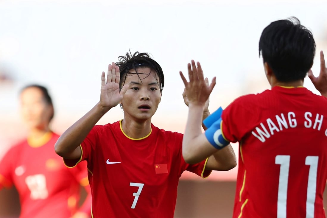 Former PSG player Wang Shuang of China celebrates scoring a goal with teammate Wang Shanshan. Photo: Reuters
