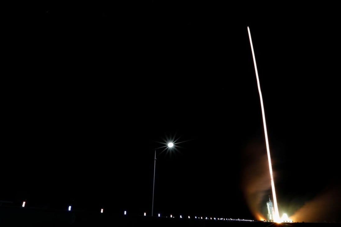 Chinas Long March-2F Y13 rocket carrying the Shenzhou-13 spacecraft and three astronauts in the countrys second crewed mission to build its own space station launches near Gansu province on October 16 Photo Reuters