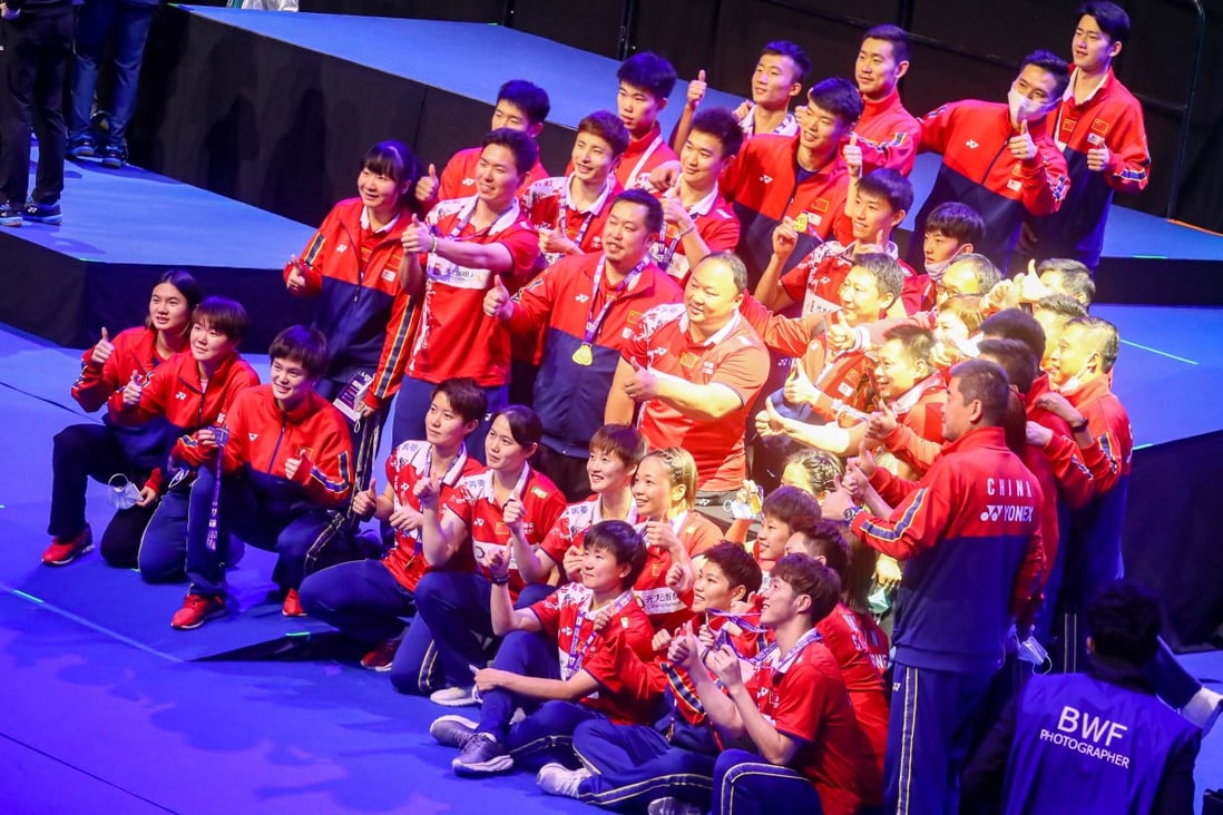 Team China celebrates on the podium after winning the BWF 2021 Sudirman Cup Badminton tournament in Vantaa, Finland. Photo: EPA