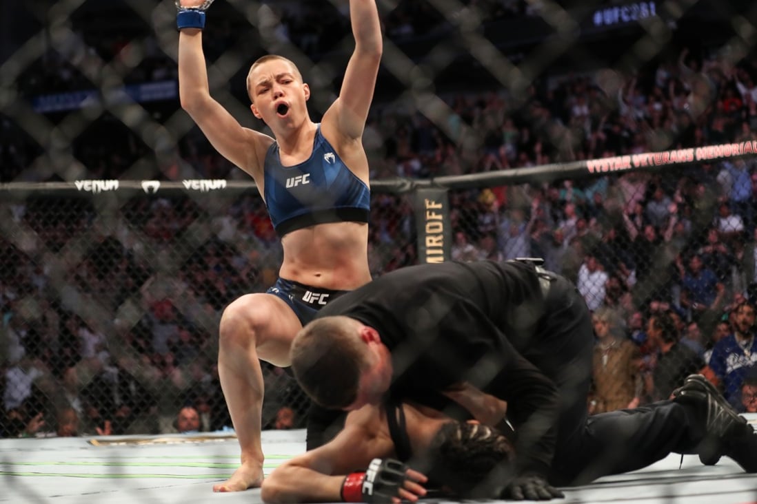 Rose Namajunas celebrates after beating Zhang Weili to win the strawweight title at UFC 261. Photos: AFP