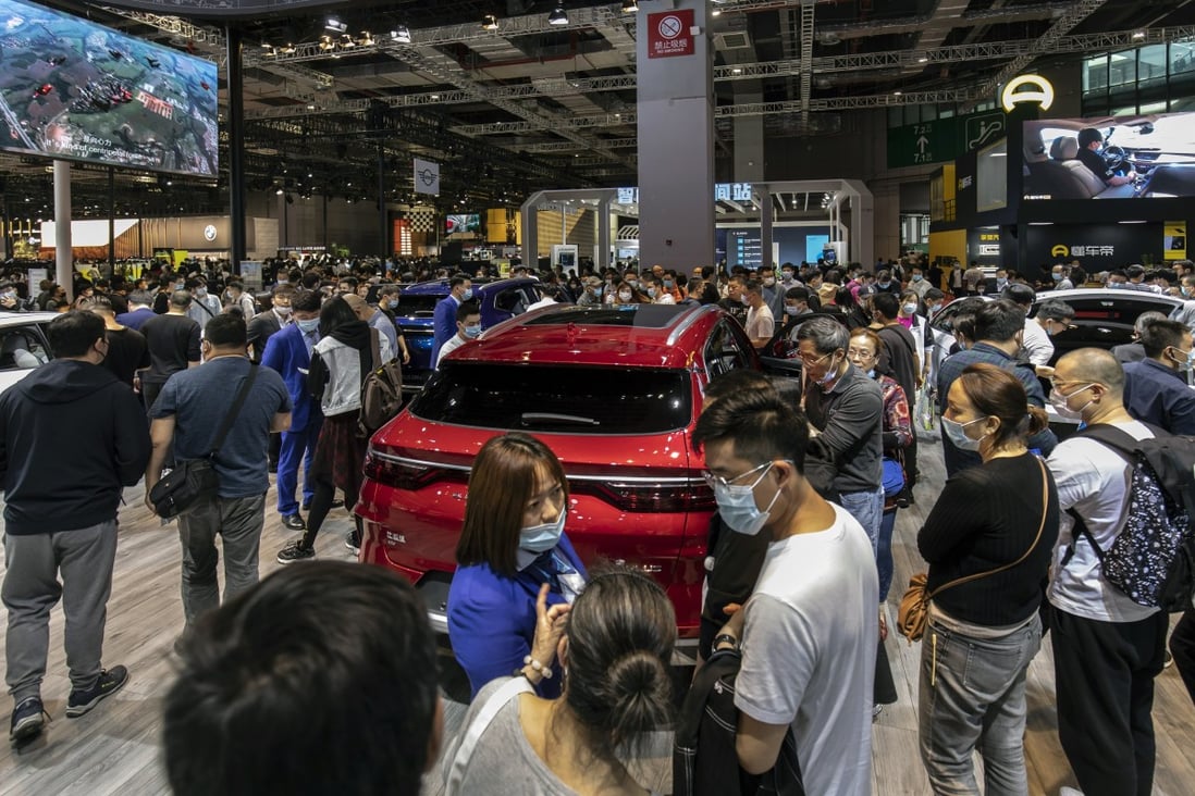 Visitors mingling at BYD’ s booth during the Auto Shanghai 2021 show in April. Photo: Bloomberg