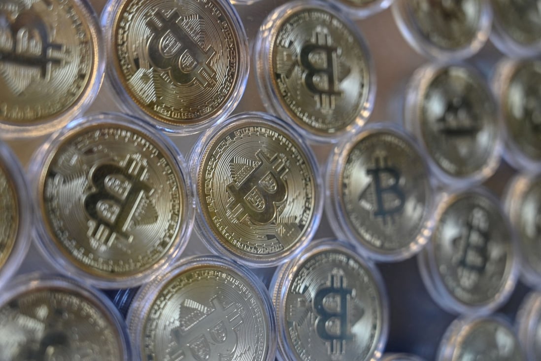 A physical imitation of a bitcoin at a cryptocurrency “bitcoin Change” shop in Istanbul on December 17, 2020. An economic study has found that bitcoin is still concentrated in relatively few hands and mining capacity even more so. Photo: AFP