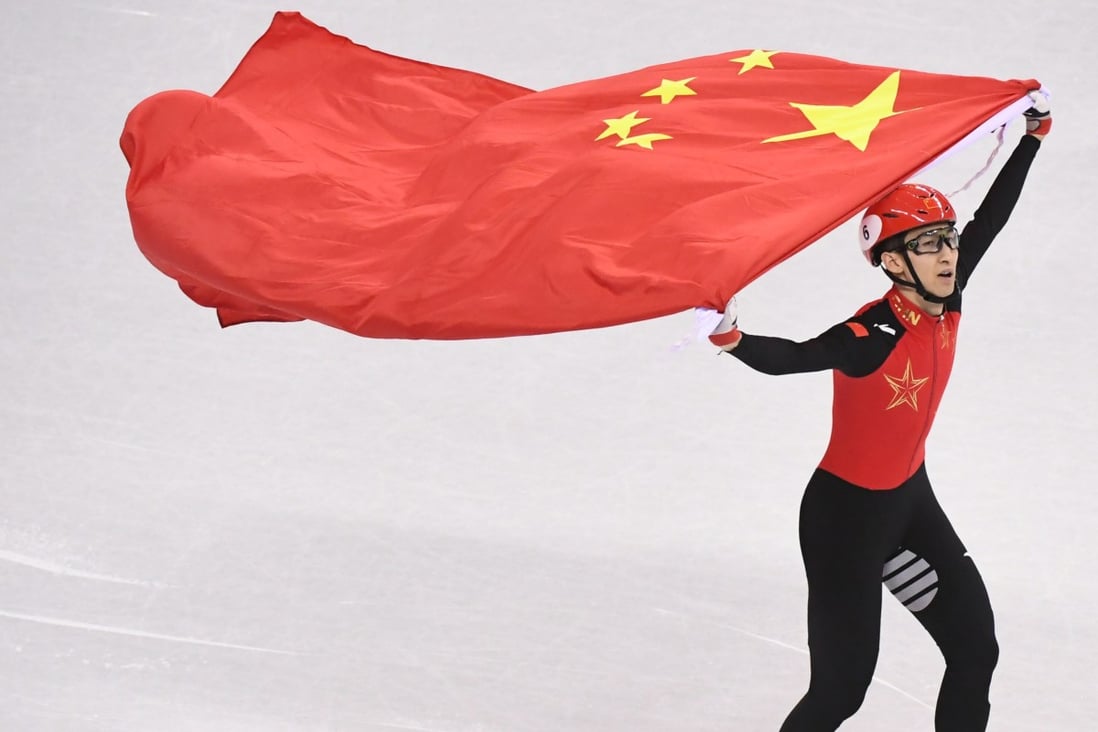 Wu Dajing of China celebrates victory after the men’s 500m final of the short track speed skating at the 2018 Pyeongchang Winter Olympic Games. Photo: Xinhua