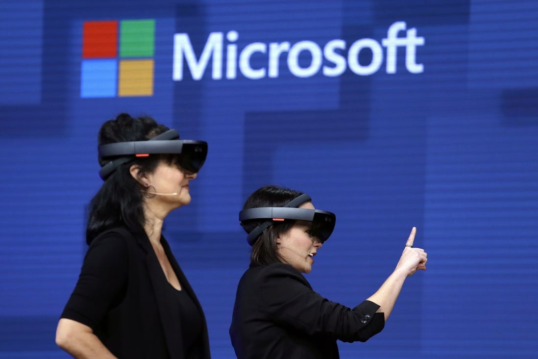 Members of a design team at Cirque du Soleil demonstrate use of Microsoft‘s HoloLens device in helping to virtually design a set at the Microsoft Build 2017 developers conference in Seattle on May 11, 2017. Photo: AP