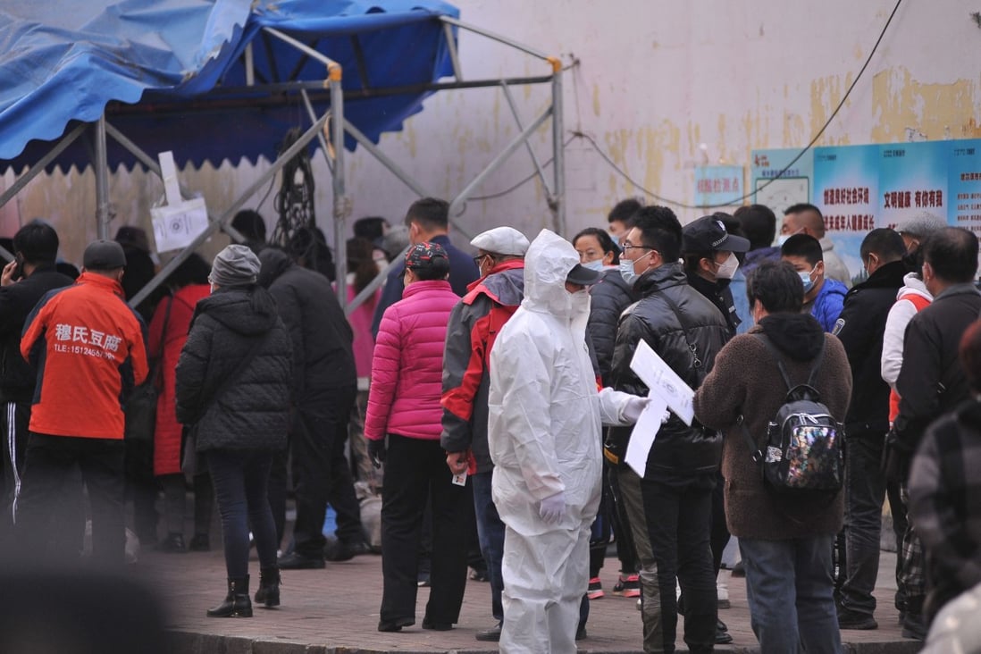 Residents line up for Covid-19 testing in Harbin, provincial capital of Heilongjiang in northeastern China, as the Delta outbreak continues to spread. Photo: AFP