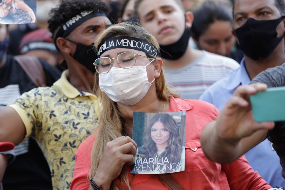 Hundreds of people attend the wake of Brazilian singer Marilia Mendonca and her uncle Abicieli Silveira Dias Filho in Goiania, Brazil on Saturday. Photo: EPA-EFE