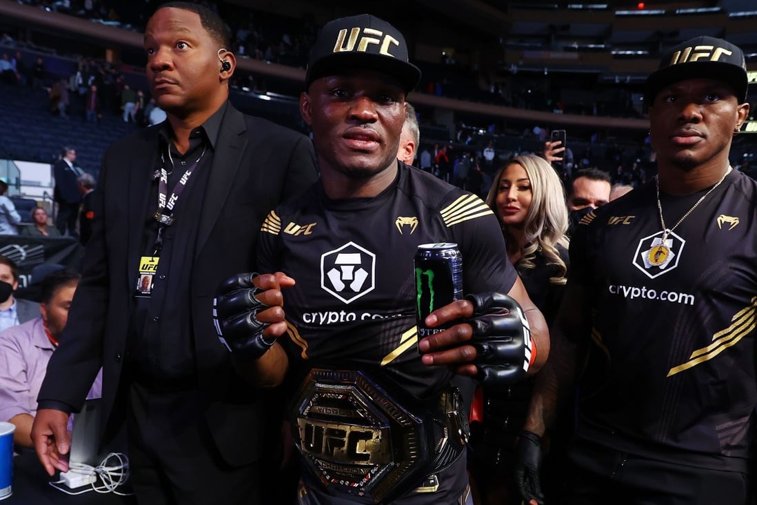 Kamaru Usman celebrates after his decision victory over Colby Covington at UFC 268. Photo: AFP