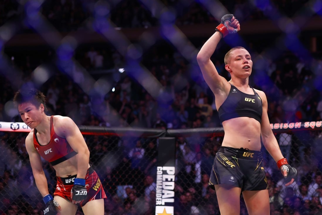Rose Namajunas and Zhang Weili (left) react after their strawweight title rematch at UFC 268. Photo: AFP